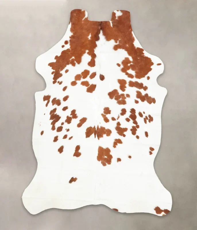 Brown and White Large European Cowhide Rug 6’7″H x 4’8″W #B5319 by Hudson Hides